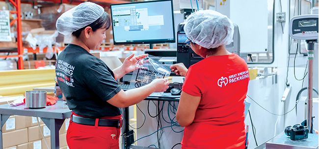 Great American Packaging workers in the warehouse