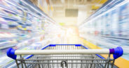 image of a shopping cart speeding through a grocery store aisle