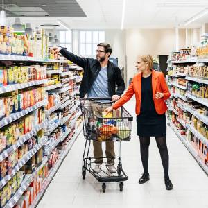 two people going grocery shopping